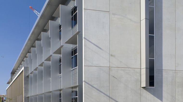 A view of Eco Conrete used in the architecture, building, commercial building, condominium, corporate headquarters, daytime, facade, headquarters, house, real estate, sky, structure, gray