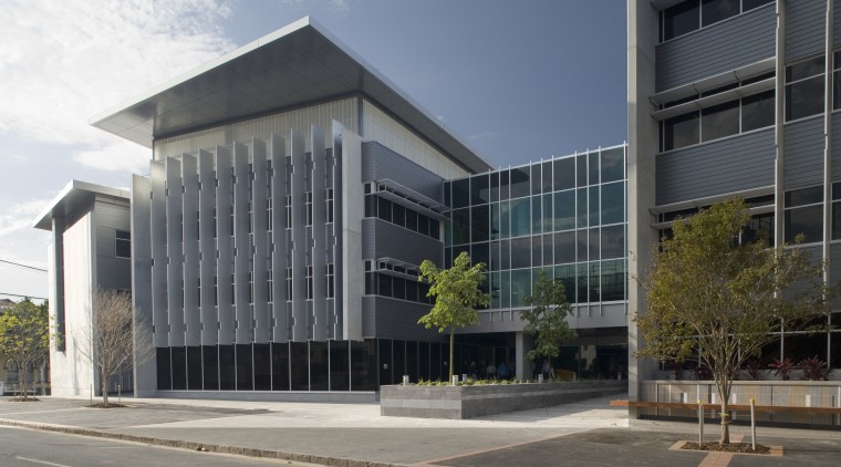 An exterior view of the greensquare building. Butler architecture, building, commercial building, condominium, corporate headquarters, facade, headquarters, mixed use, property, real estate, gray, black