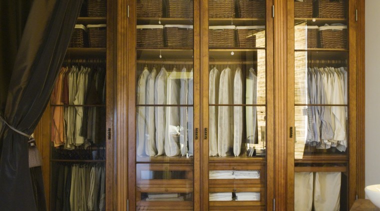 a view of this closet constructed out cabinetry, ceiling, door, floor, flooring, furniture, hardwood, home, interior design, room, window, wood, wood flooring, wood stain, brown