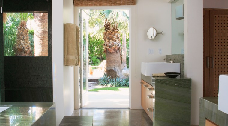 Pegs provide plenty of hanging space for towels, architecture, bathroom, ceiling, countertop, floor, flooring, home, interior design, kitchen, real estate, room, tile, gray