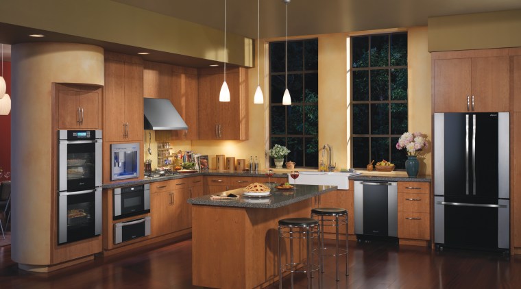 A view of this kitchen featuring the latetest cabinetry, countertop, cuisine classique, floor, flooring, hardwood, interior design, kitchen, room, wood flooring, brown