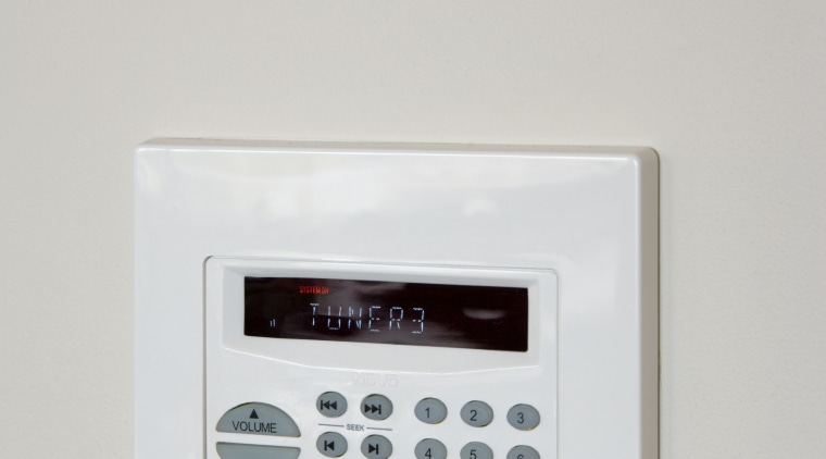 A Nuvo Multiroom Audio Keypad with LCD dispaly alarm device, product, product design, security alarm, gray