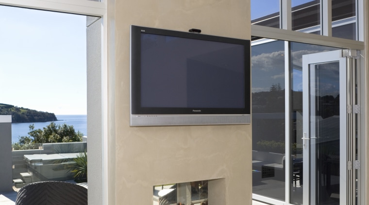 A close up view of the fireplace in fireplace, floor, hearth, interior design, living room, gray