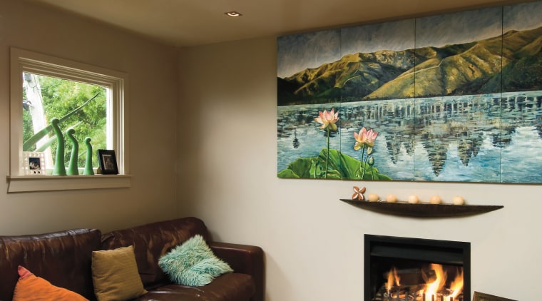 A view of these living areas feautring resene ceiling, fireplace, hearth, home, interior design, living room, wall, brown