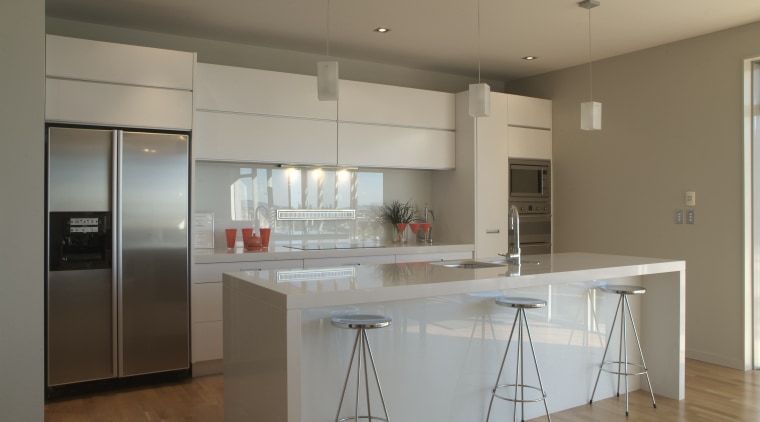 Smeg appliances complement the clean lines of this cabinetry, countertop, cuisine classique, floor, home, interior design, kitchen, property, real estate, room, gray, brown