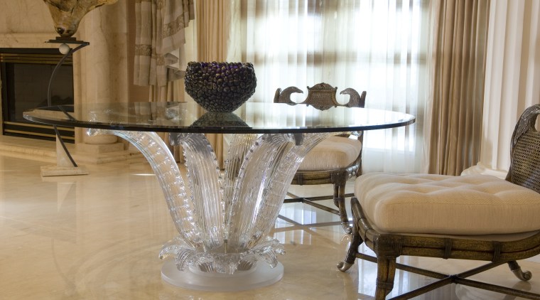 The Cactus Table is in the ballroom near chair, coffee table, dining room, floor, flooring, furniture, home, interior design, living room, room, table, brown