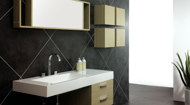 A view of a vanity from Tonusa. - angle, bathroom, bathroom accessory, bathroom cabinet, floor, furniture, interior design, product, product design, sink, tap, tile, wall, black, white