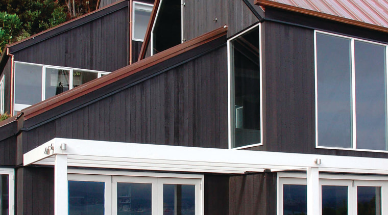 A view of some exterior paint from Resene. cottage, facade, home, house, real estate, roof, shed, siding, window, wood, black