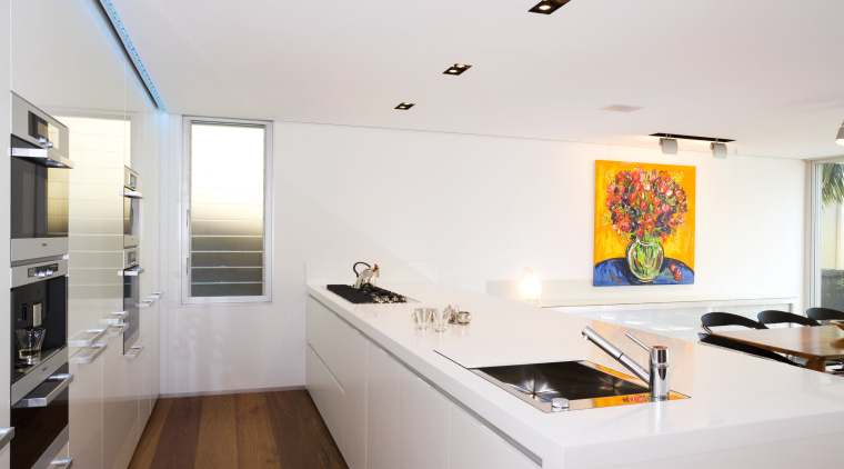 View of kitchen design by Linda Haefeli, and apartment, architecture, house, interior design, kitchen, real estate, room, white