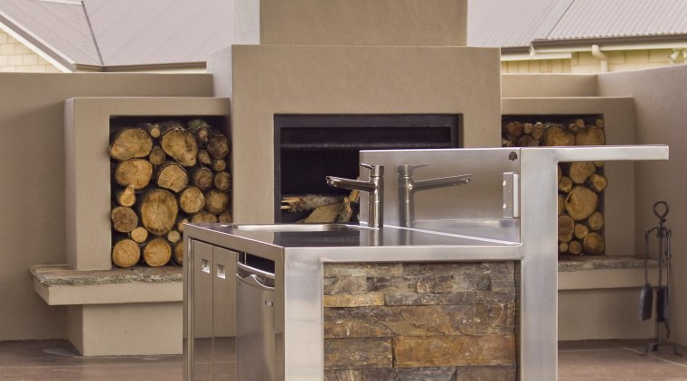 View of kitchens designed by Kira Gray of countertop, floor, flooring, interior design, kitchen, brown, white