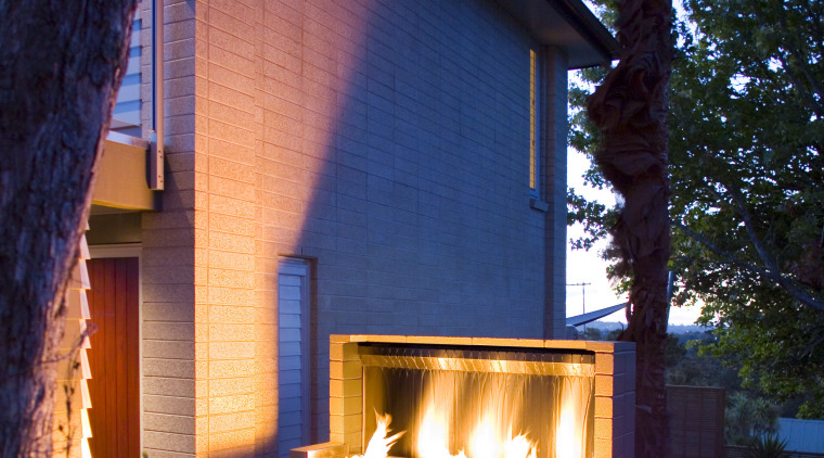 view of outdoor fireplace from Real Fires. - architecture, backyard, cottage, facade, home, house, lighting, property, real estate, residential area, shed, siding, window, wood, blue