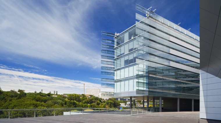 View of the Owen G Glenn Building at architecture, building, commercial building, condominium, corporate headquarters, daytime, facade, headquarters, metropolitan area, mixed use, real estate, sky, gray