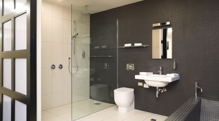 View of the master bedroomand ensuite featuring an bathroom, floor, home, interior design, room, tile, black, white
