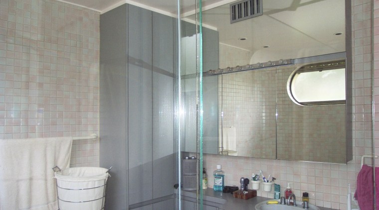 The original bathroom had a cluttered feel.small wall bathroom, ceiling, floor, glass, interior design, property, room, tile, window, gray