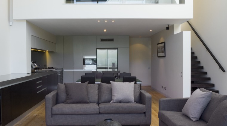 Image of the lounge area in this home architecture, floor, flooring, hardwood, home, house, interior design, laminate flooring, living room, loft, real estate, room, wood, wood flooring, gray