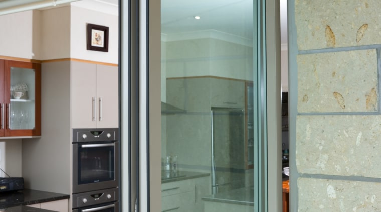 In a country where sunshine is often swiftly door, glass, window, gray