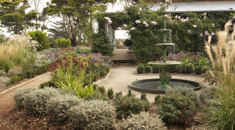 View of garden which features an antique fountain backyard, botanical garden, garden, grass, landscape, landscaping, outdoor structure, plant, tree, walkway, yard, brown