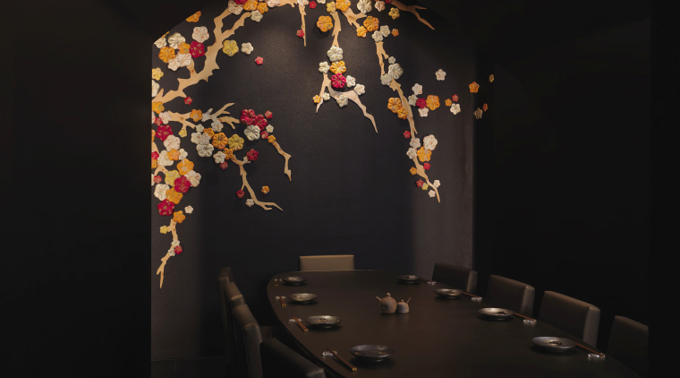 This private dining room has a sake theme, darkness, interior design, light fixture, lighting, still life photography, black