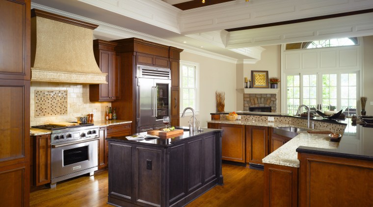 Different wood and granite types visually draw the cabinetry, ceiling, countertop, cuisine classique, estate, flooring, hardwood, interior design, kitchen, real estate, room, brown, gray