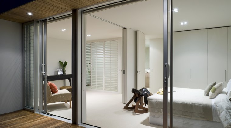 Exterior view of the master bedroom which includes door, interior design, sliding door, window, gray
