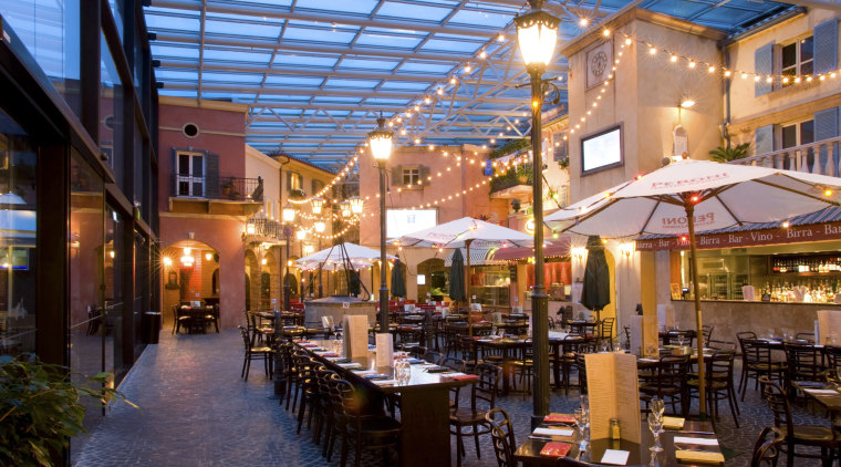 View of a restaurant which was designed and city, downtown, evening, mixed use, restaurant