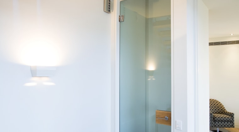 The inclusion of a lift in a multi-levelled apartment, ceiling, daylighting, door, floor, flooring, glass, hardwood, home, house, interior design, laminate flooring, lighting, real estate, room, wall, wood, wood flooring, white