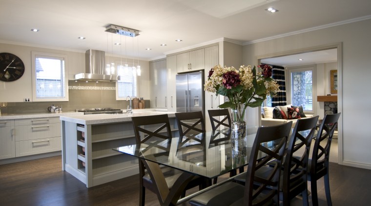 Black Beauty's well-appointed entertainer's kitchen offers every modern countertop, dining room, home, interior design, kitchen, real estate, room, gray, black