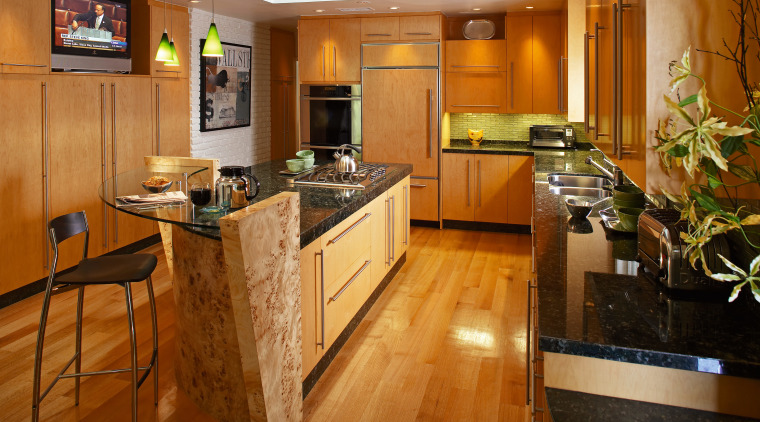 The focal point of this kitchen is the cabinetry, countertop, cuisine classique, floor, flooring, hardwood, interior design, kitchen, real estate, room, wood, wood flooring, brown, orange