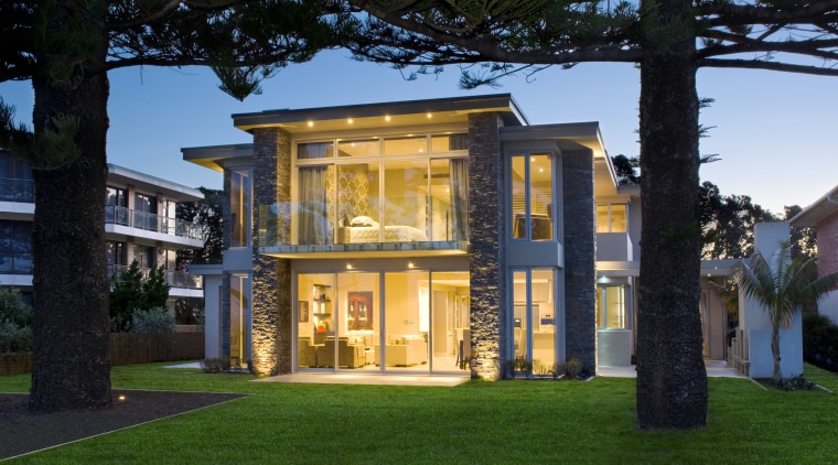 Expansive glazing and cantilevered balconies maximise the ocean architecture, building, cottage, estate, facade, grass, home, house, lighting, mansion, property, real estate, residential area, villa, window, black, green