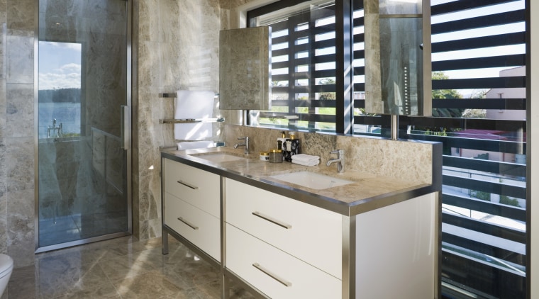 View of the master bathroom with floor-to-ceiling marble, bathroom, cabinetry, countertop, interior design, kitchen, room, gray