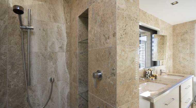 View of the master bathroom with floor-to-ceiling marble, bathroom, floor, flooring, interior design, room, tile, wall, gray, brown