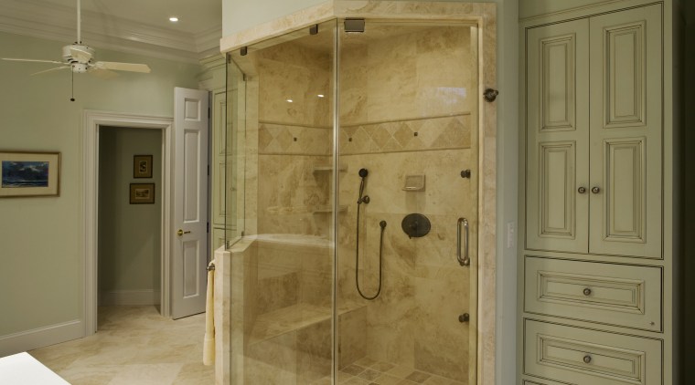 Image of a bathroom designed by an NKBA bathroom, floor, flooring, home, plumbing fixture, room, shower, tile, brown