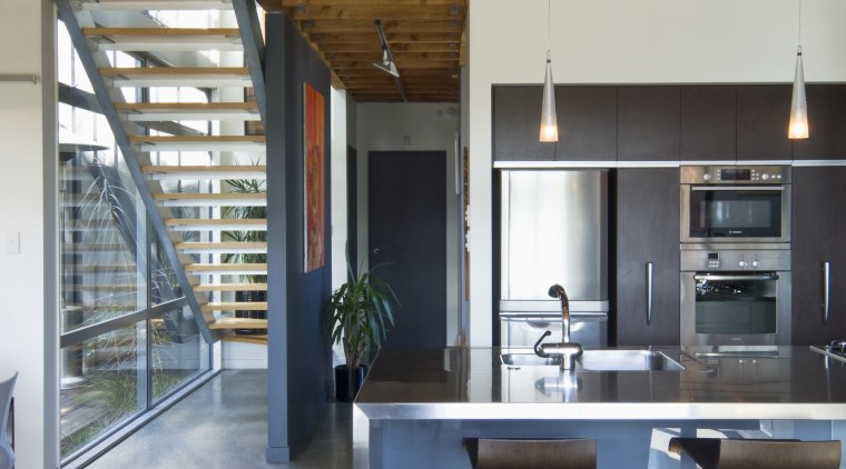 View of kitchen with stainless steel kitchen island, architecture, beam, ceiling, countertop, daylighting, house, interior design, kitchen, loft