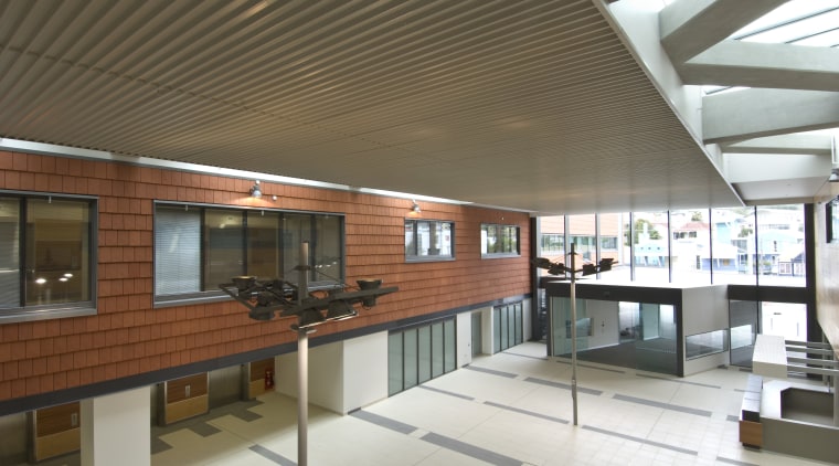 Rider Levett Bucknall provided independent cost planning, estimation ceiling, daylighting, interior design, lobby, brown, white