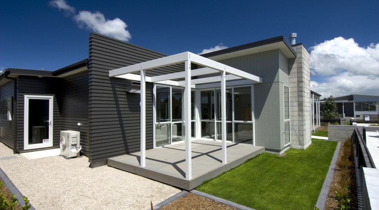 This home is part of a new coastal architecture, elevation, facade, home, house, property, real estate, residential area, window, blue