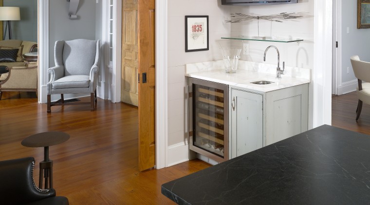 View of separate drinks area with wine fridge countertop, floor, flooring, furniture, hardwood, interior design, kitchen, laminate flooring, living room, real estate, room, table, wood, wood flooring, gray