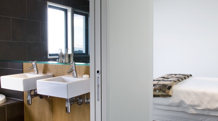 View of a bedroom with bathroom ensuite which architecture, bathroom, daylighting, floor, flooring, home, house, interior design, real estate, room, gray