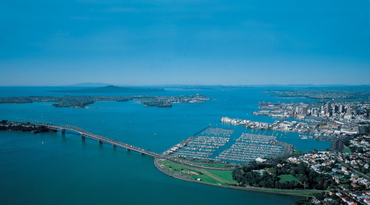 Image of the beautiful Auckland City. - Image aerial photography, artificial island, bay, bird's eye view, city, coast, coastal and oceanic landforms, fixed link, inlet, sea, sky, water, water resources, teal