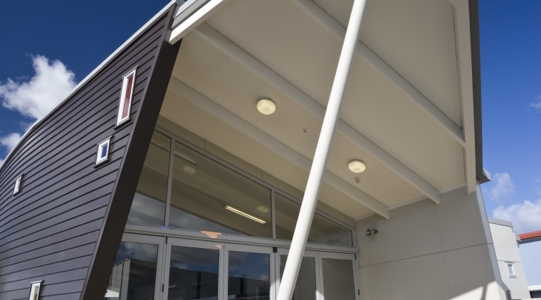 Exterior view of Clubhouse 274 which was built architecture, building, commercial building, corporate headquarters, daylighting, facade, house, roof, siding, structure, gray, blue