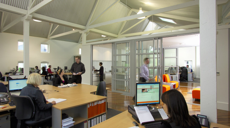 Interior view of the Enabling offices which feature institution, office, gray