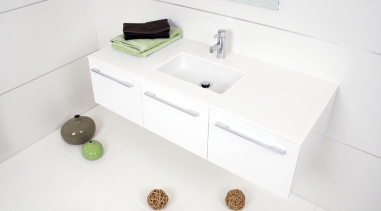 View of a bathroom which features a wall-hung bathroom, bathroom accessory, bathroom cabinet, bathroom sink, drawer, furniture, plumbing fixture, product design, sink, tap, white