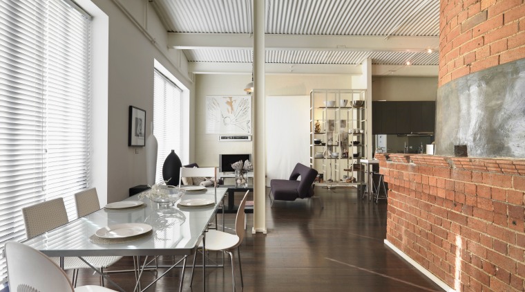 View of open-plan living and dining areas with architecture, ceiling, floor, flooring, interior design, living room, lobby, loft, white