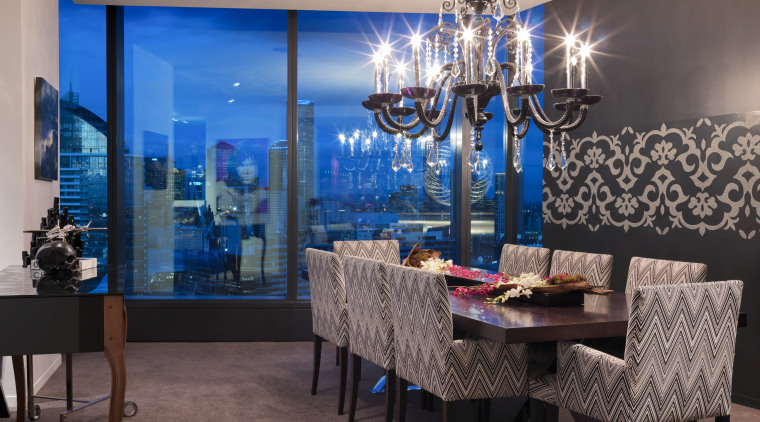 View of dining area which features a dining ceiling, dining room, interior design, living room, restaurant, room, table, wall, window, gray, black