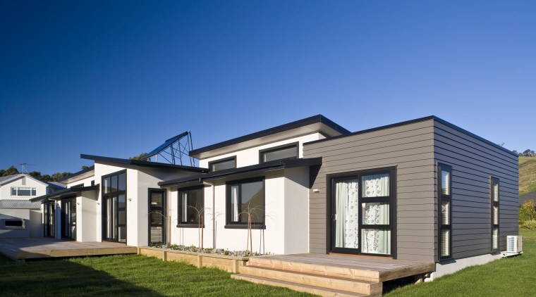 Exterior view of a David Reid Homes show architecture, building, cottage, elevation, estate, facade, home, house, property, real estate, residential area, siding, blue