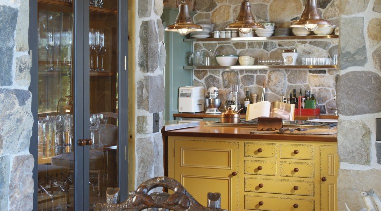View of an old-styled kitchen which features a cabinetry, furniture, home, interior design, kitchen, room, wood, brown