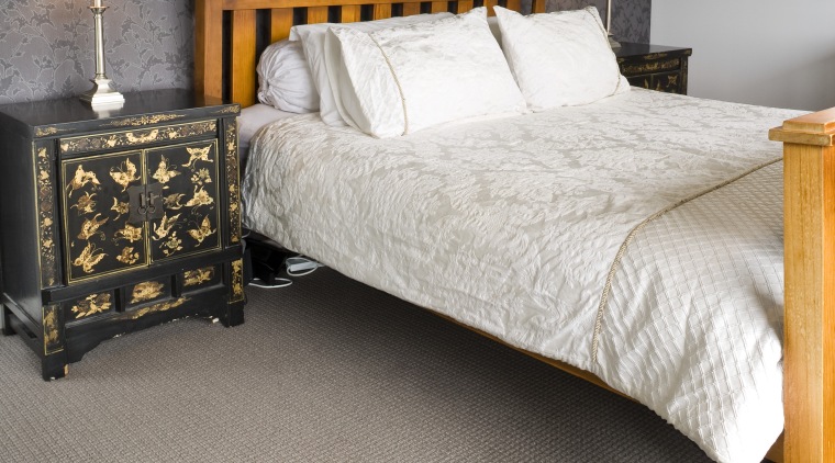 View of a bedroom area which features pure bed, bed frame, bed sheet, bedroom, duvet cover, floor, flooring, furniture, hardwood, home, interior design, laminate flooring, mattress, room, wall, wood, wood flooring, gray