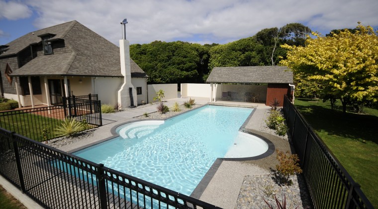 View of a pool are with a resort cottage, estate, home, house, leisure, property, real estate, resort, swimming pool, villa, water, gray