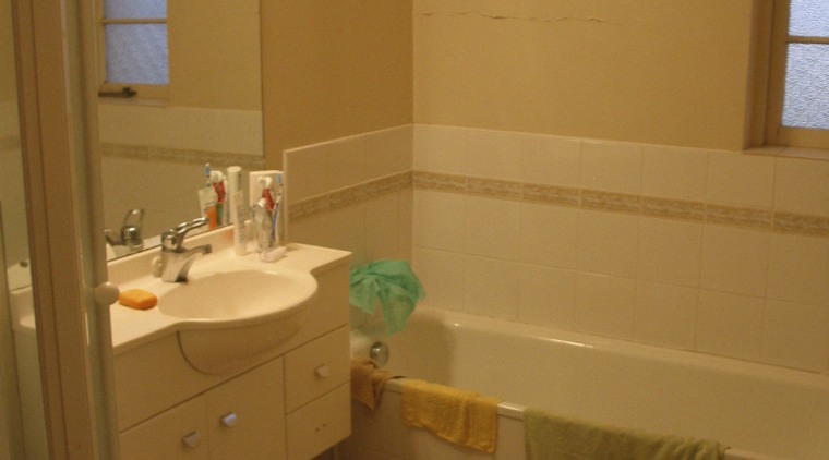 View of the bathroom before remodeling. - View bathroom, floor, flooring, home, house, interior design, plumbing fixture, product, property, room, sink, tile, wall, wood, brown, orange