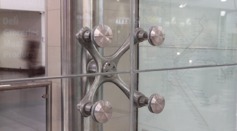 View of the front of a railway station glass, gray