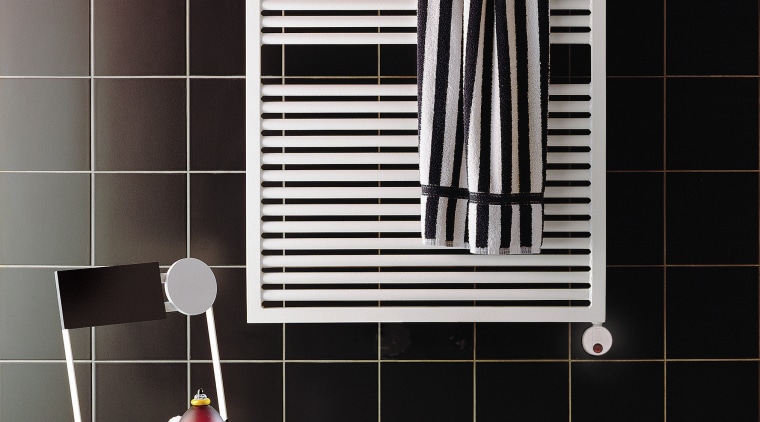 View of a bathroom which features a towel black, floor, flooring, furniture, interior design, line, product, product design, shelf, shelving, tile, wall, window, black